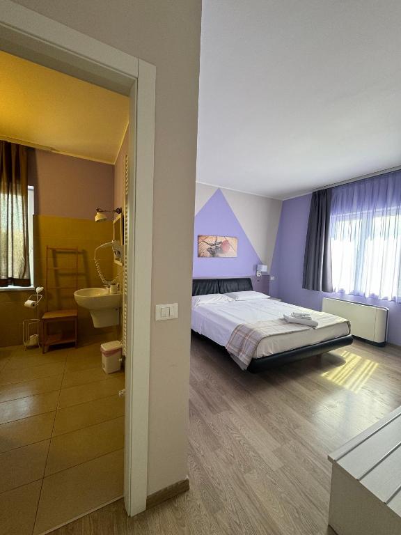 Postel nebo postele na pokoji v ubytování Albergo Trattoria Italia
