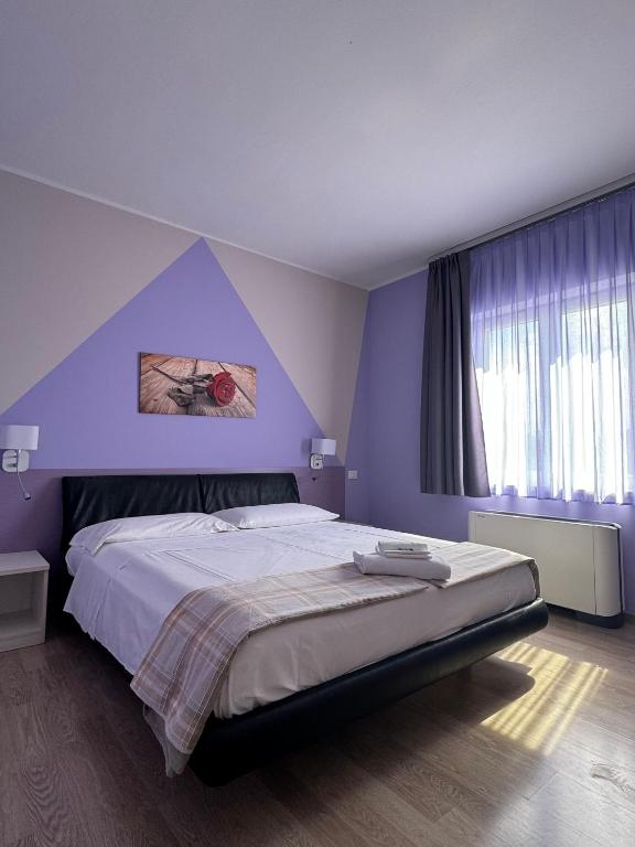 Postel nebo postele na pokoji v ubytování Albergo Trattoria Italia