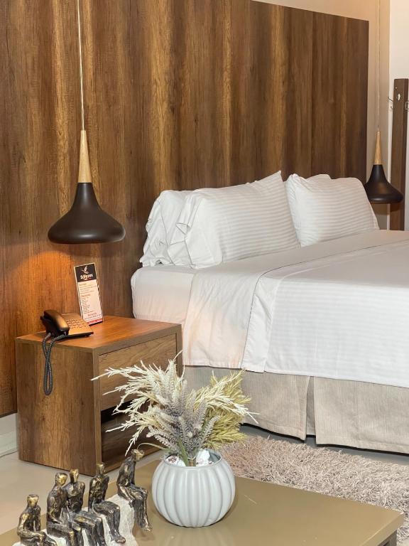 Postel nebo postele na pokoji v ubytování Hotel Santorini Loft