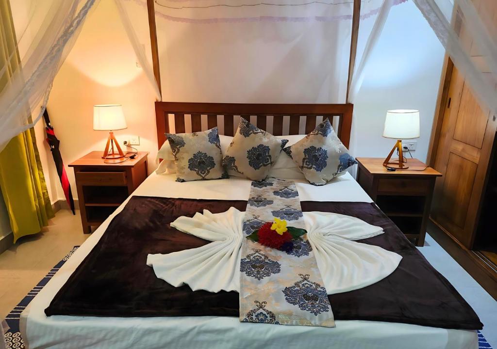 Postel nebo postele na pokoji v ubytování Buisson Guesthouse