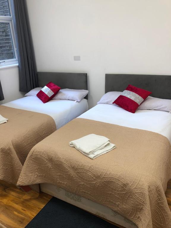 Postel nebo postele na pokoji v ubytování World Hotel