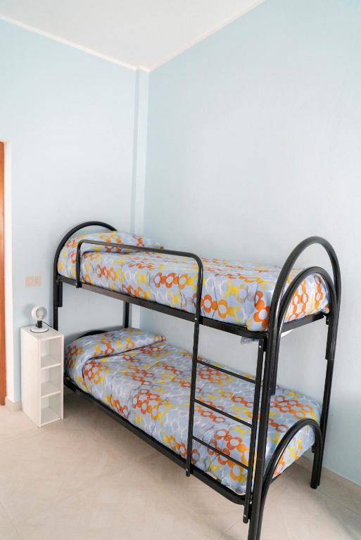 Postel nebo postele na pokoji v ubytování Villa Claudia e Simone