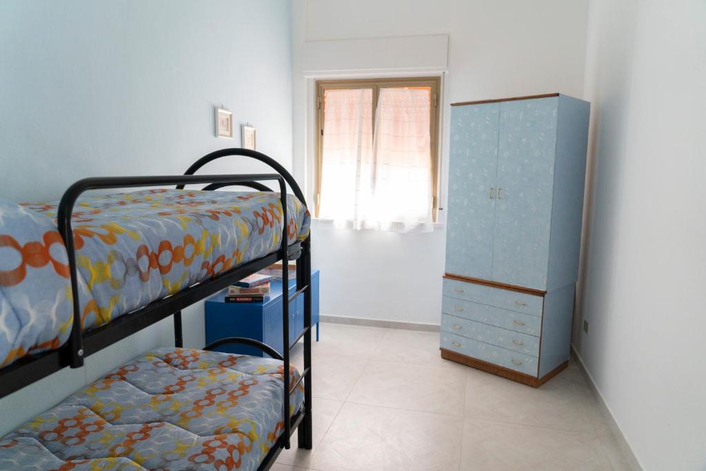 Postel nebo postele na pokoji v ubytování Villa Claudia e Simone