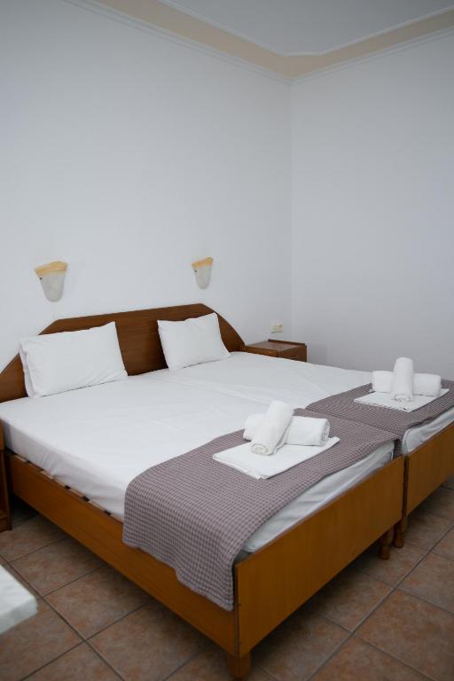 Postel nebo postele na pokoji v ubytování Bora Bora Pydna Hotel