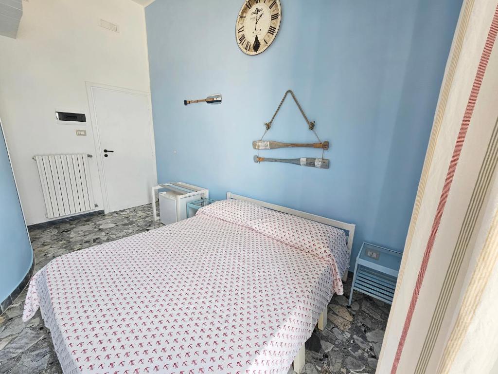 Postel nebo postele na pokoji v ubytování Maridea - Camere con vista al Porto