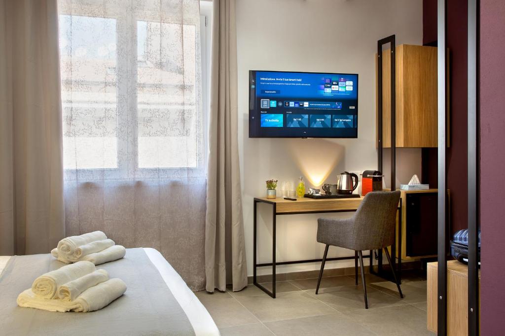 Postel nebo postele na pokoji v ubytování MARE FUORI ROOMS