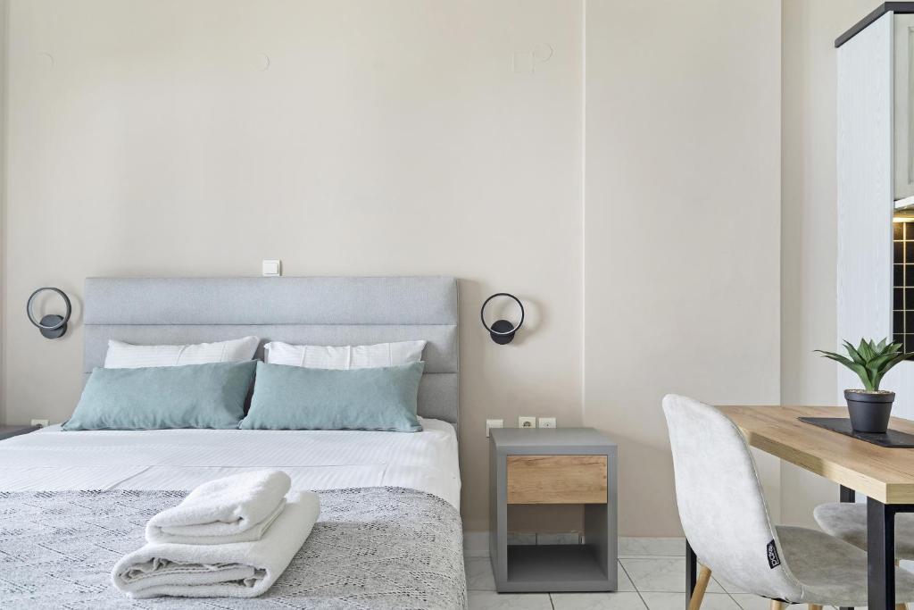 Posteľ alebo postele v izbe v ubytovaní Sunset Premium Studio 7