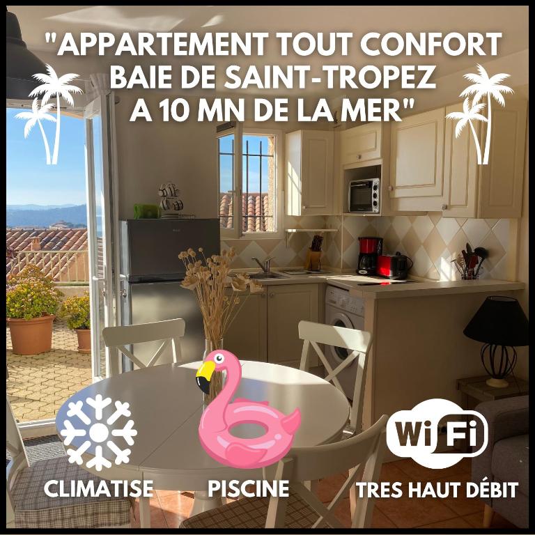 une publicité pour une maison avec un flamant rose dans une cuisine dans l'établissement EXCEPTIONNEL - Appartement BAIE ST TROPEZ - Résidence BELLEVUE - LES ISSAMBRES, à Roquebrune-sur Argens