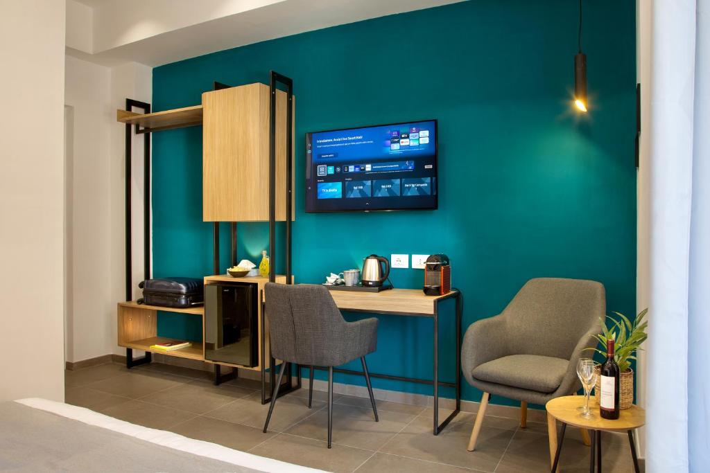TV a/nebo společenská místnost v ubytování MARE FUORI ROOMS