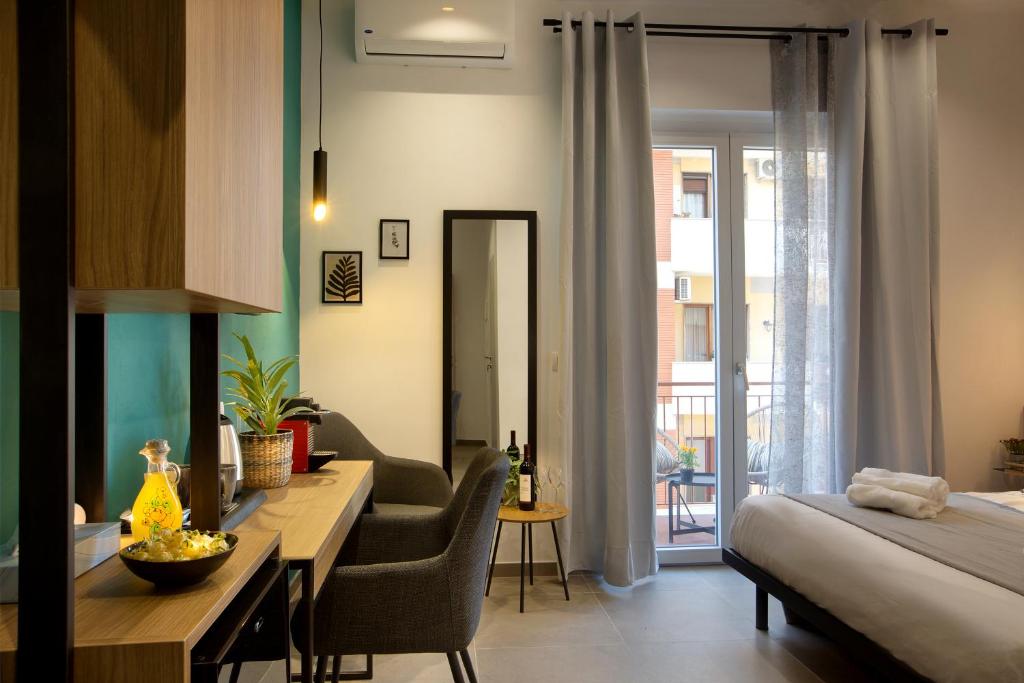 Postel nebo postele na pokoji v ubytování MARE FUORI ROOMS