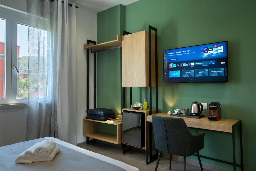 Postel nebo postele na pokoji v ubytování MARE FUORI ROOMS