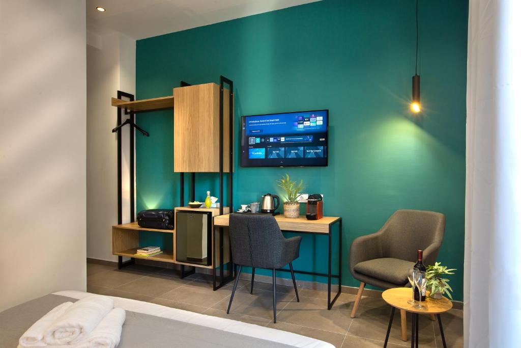 TV a/nebo společenská místnost v ubytování MARE FUORI ROOMS