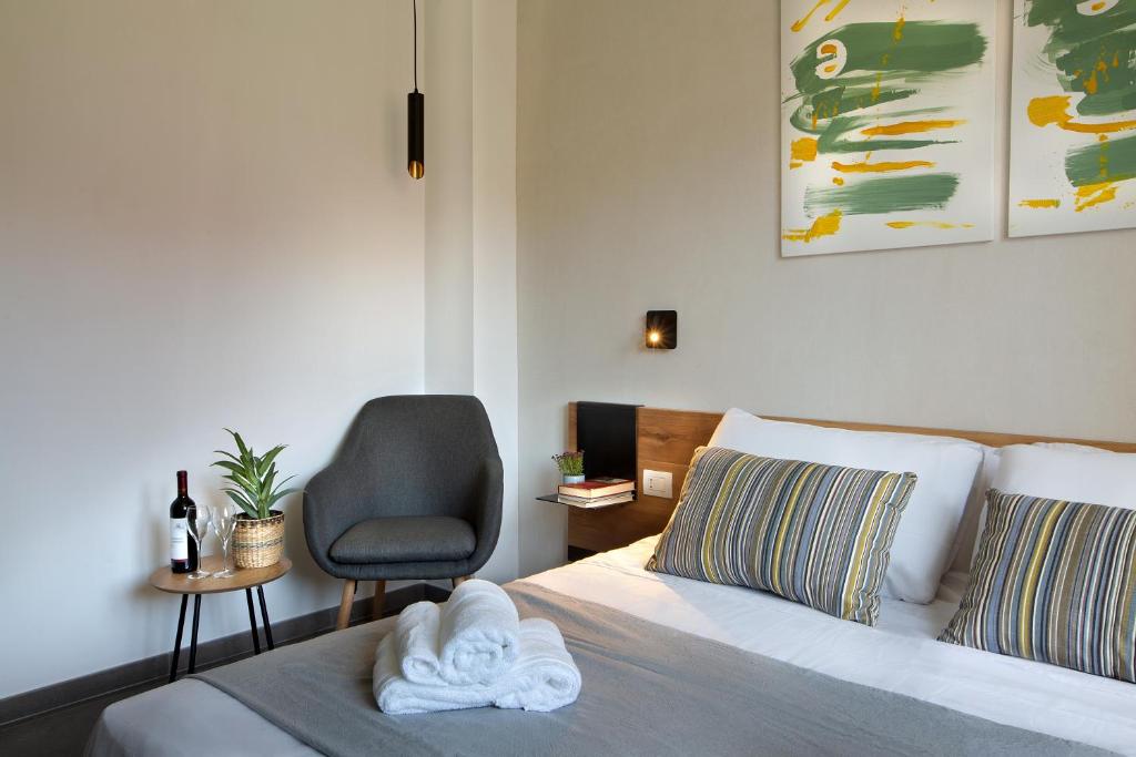 Postel nebo postele na pokoji v ubytování MARE FUORI ROOMS