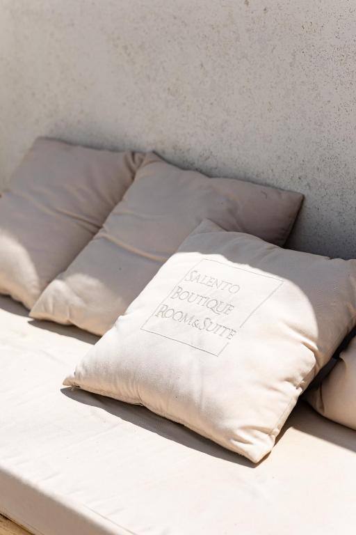 Postel nebo postele na pokoji v ubytování Salento Boutique Suite