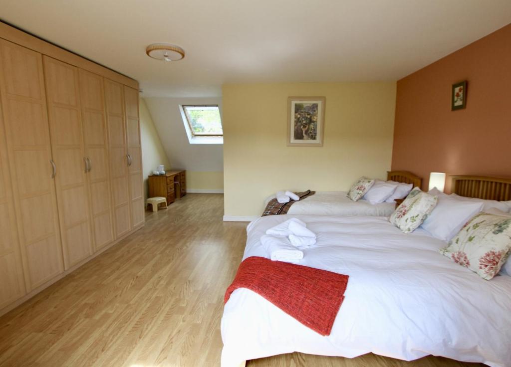 Postel nebo postele na pokoji v ubytování Meadow Rise Guest House