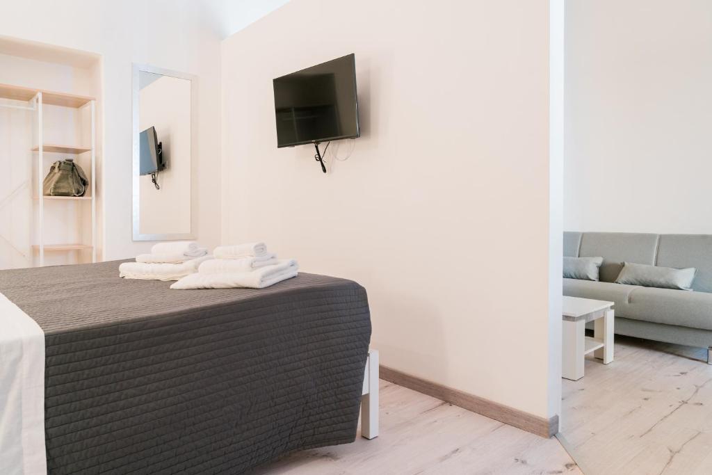 TV a/nebo společenská místnost v ubytování FG Vacanze