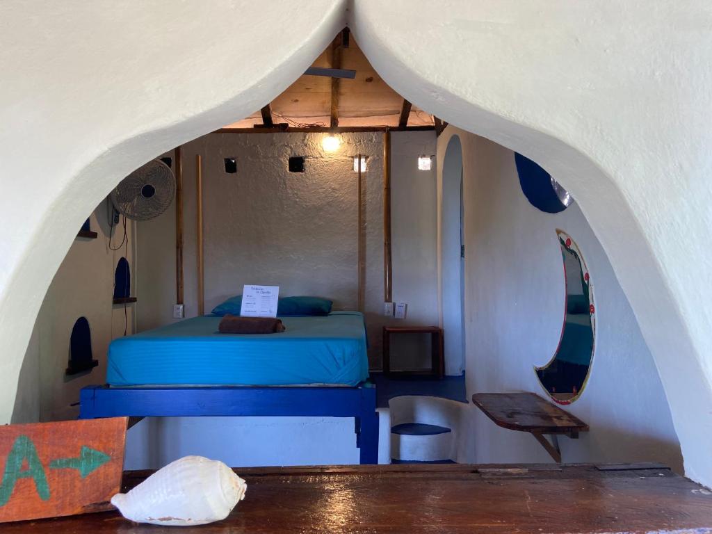 Ένα ή περισσότερα κρεβάτια σε δωμάτιο στο Mixtli Ecohouse, Bungalows - Starlink Internet