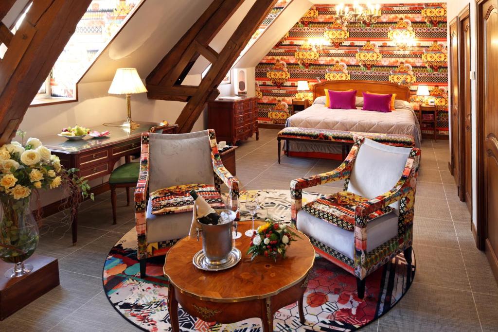 Posezení v ubytování Hôtel Le Cep & Spa