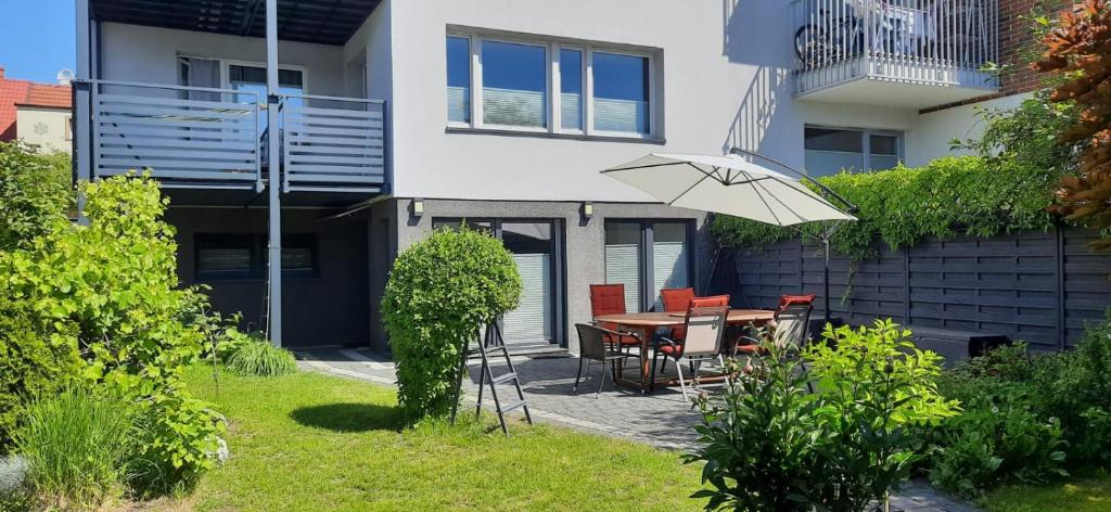 Vonkajšia záhrada v ubytovaní Apartament Lidia