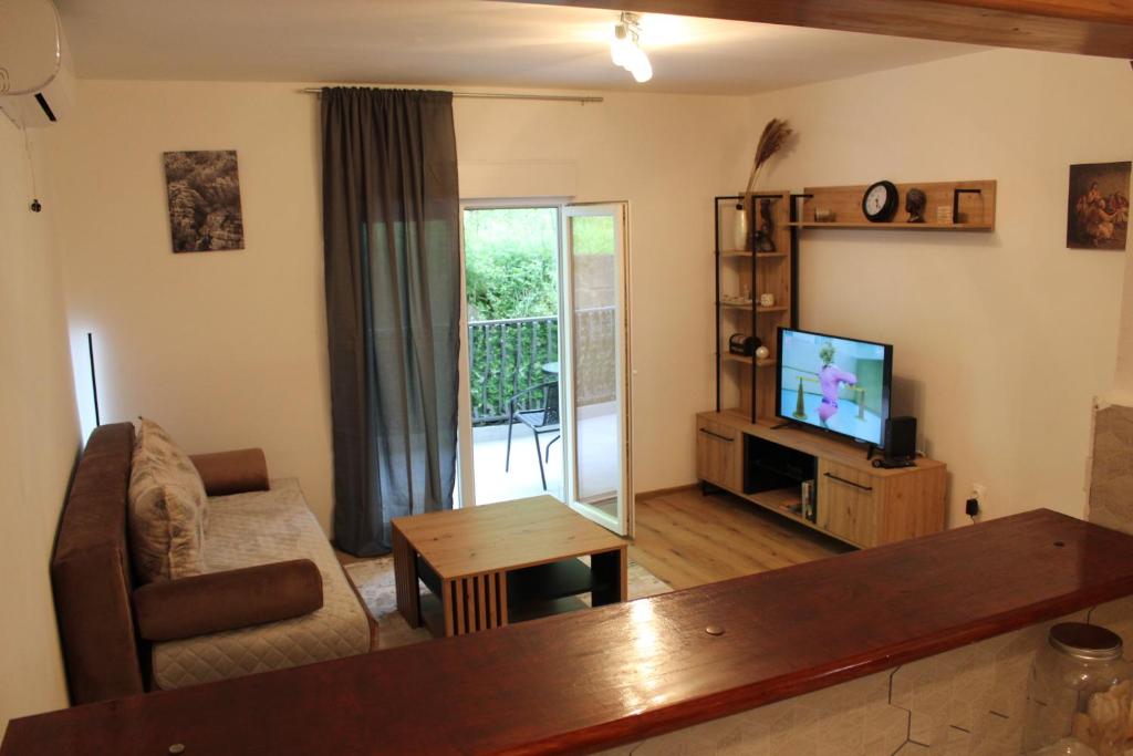 Televisor o centre d'entreteniment de Una apartment