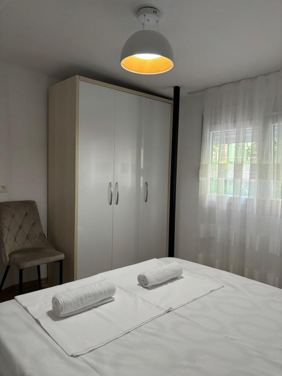 Postel nebo postele na pokoji v ubytování Vacation Studio by Andrea