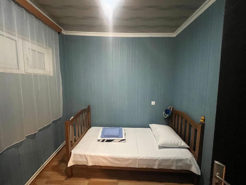 Postel nebo postele na pokoji v ubytování Nano Guest House