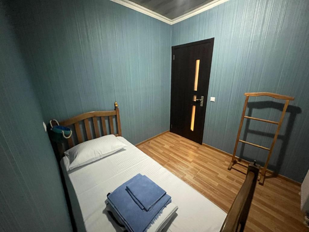 Postel nebo postele na pokoji v ubytování Nano Guest House