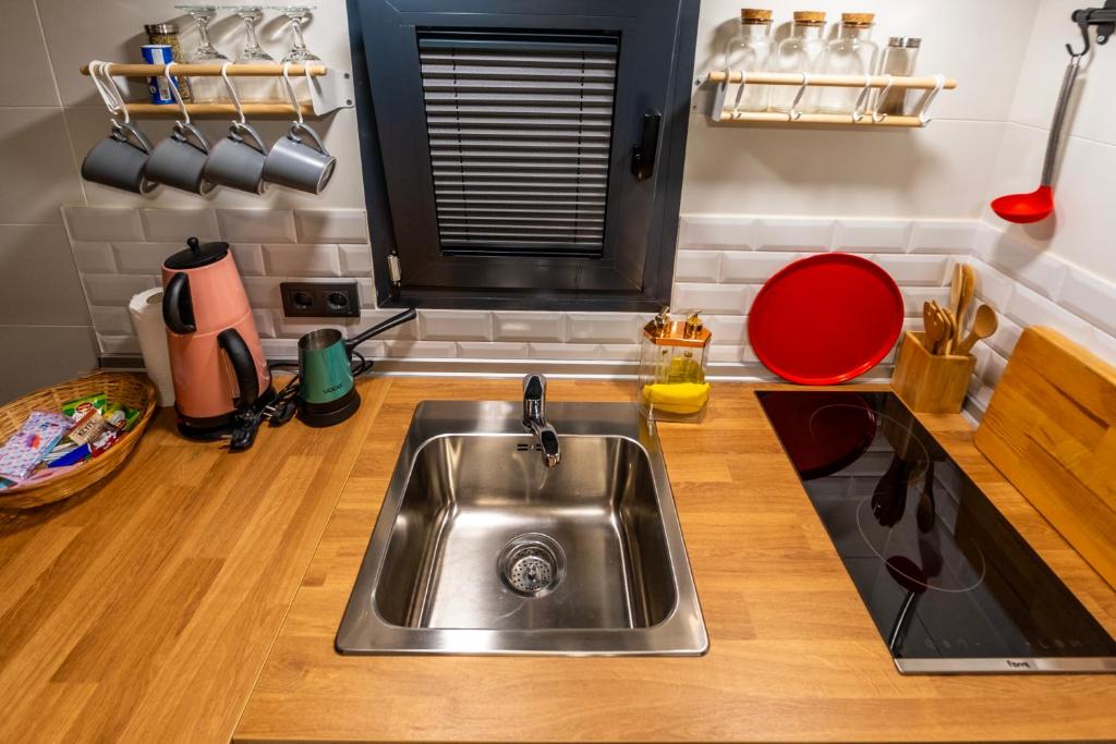 Kuchyň nebo kuchyňský kout v ubytování Efe Tiny House