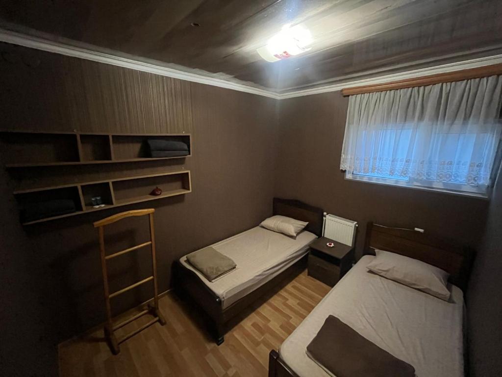 Postel nebo postele na pokoji v ubytování Nano Guest House