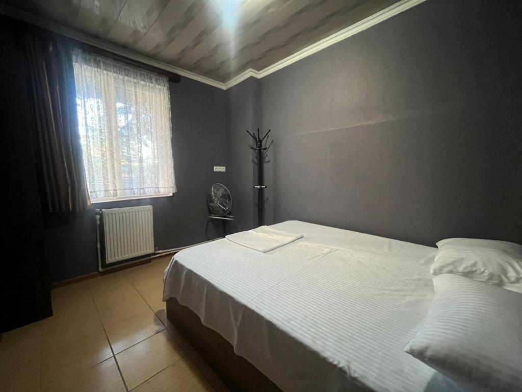 Postel nebo postele na pokoji v ubytování Nano Guest House