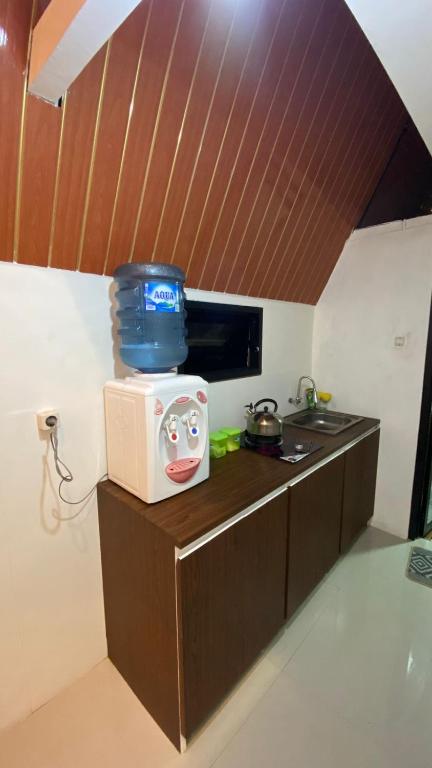 Kuchyň nebo kuchyňský kout v ubytování AGRIYA LUBIS CABIN