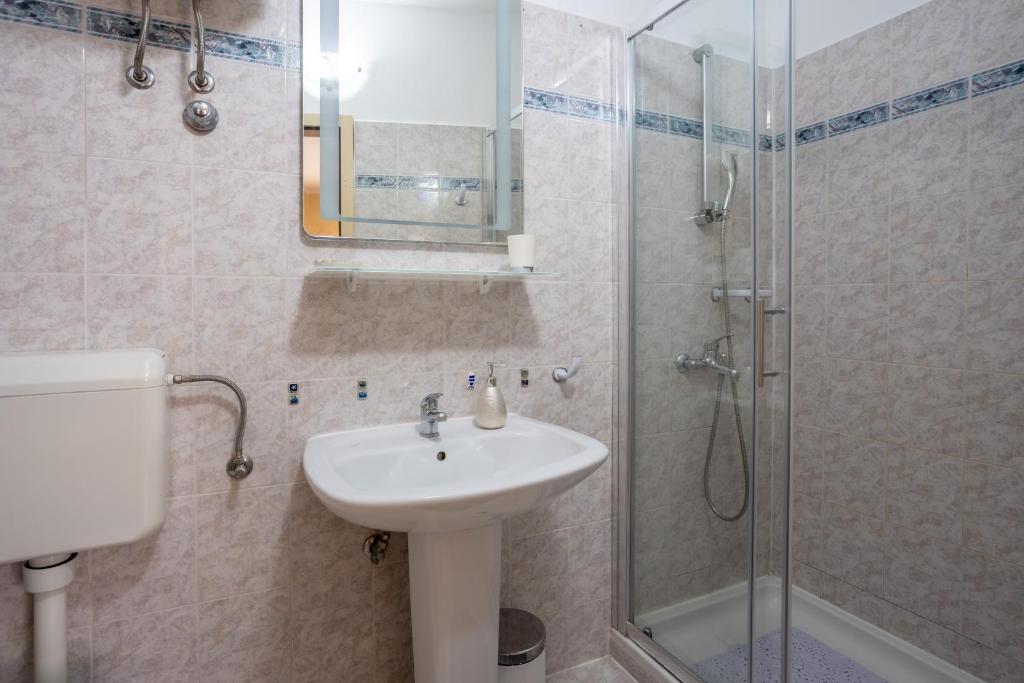 Koupelna v ubytování Central Apartments Circolo