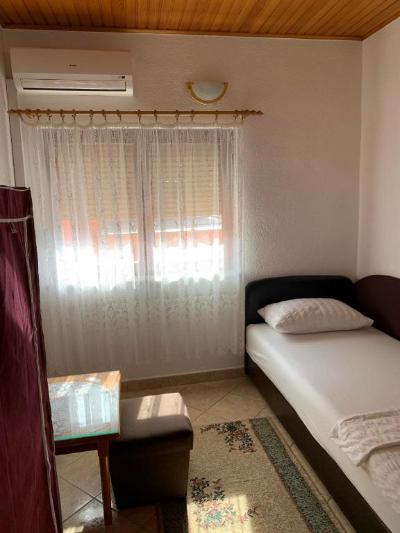 Postel nebo postele na pokoji v ubytování Guesthouse Centro