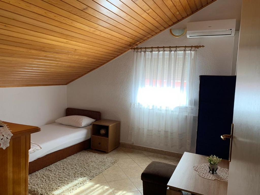 Postel nebo postele na pokoji v ubytování Guesthouse Centro