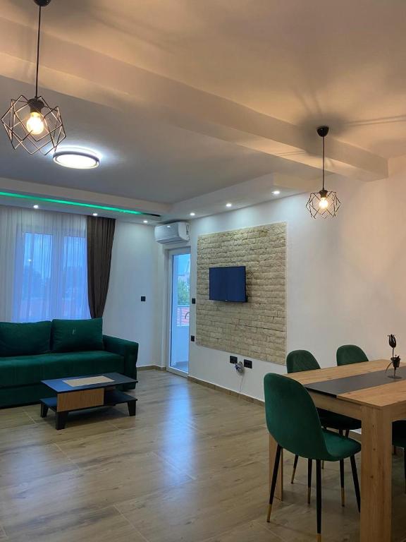 TV a/nebo společenská místnost v ubytování Vila Ideal