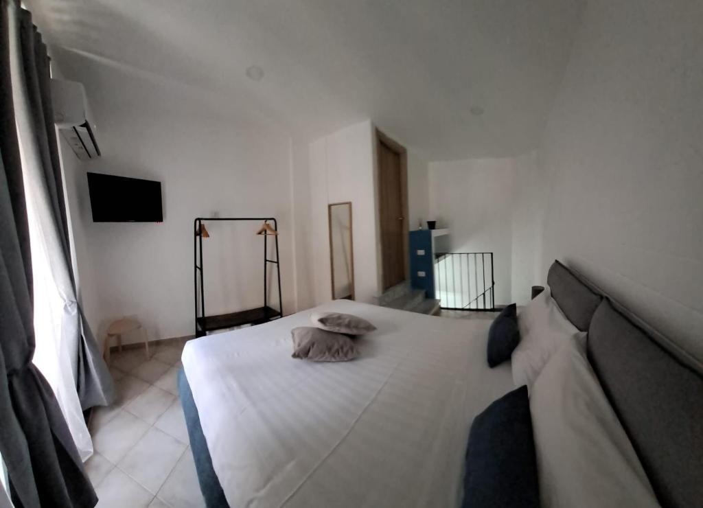 Postel nebo postele na pokoji v ubytování Stop al Duomo