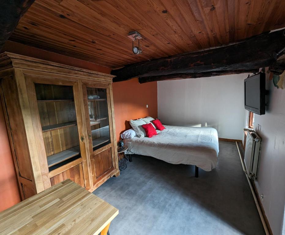 Postel nebo postele na pokoji v ubytování gîte de l'olivier - 3 étoiles - domaine de l'olivier