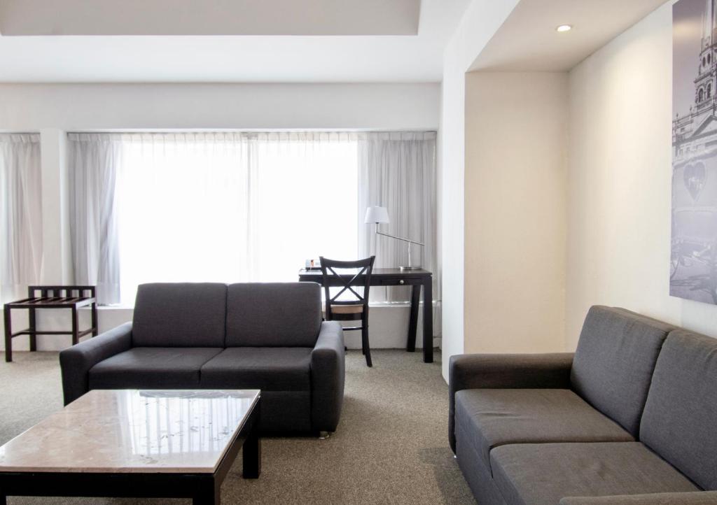 Posezení v ubytování Hotel Plaza Génova Centro