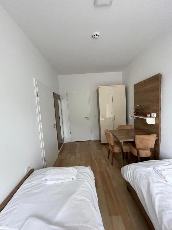 Postel nebo postele na pokoji v ubytování Hotel Oniro