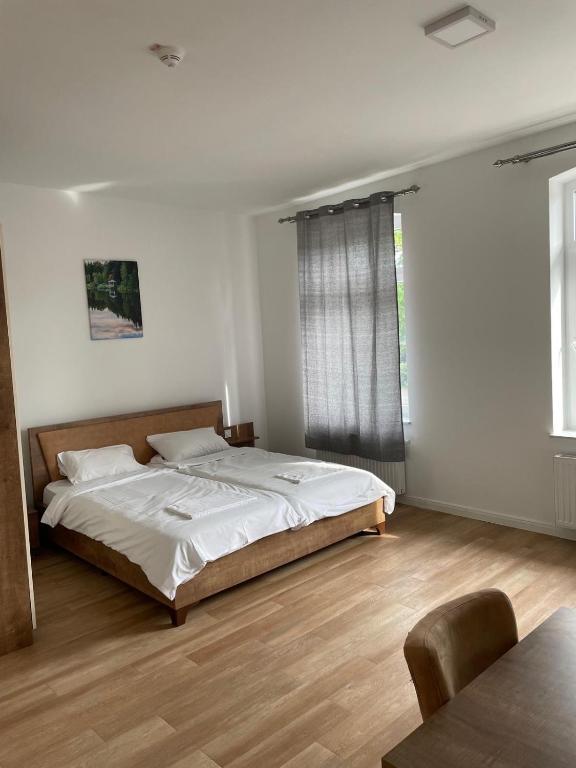 Postel nebo postele na pokoji v ubytování Hotel Oniro