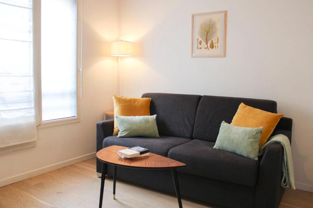 Et opholdsområde på Charming 28 m Love Nest in Vanves