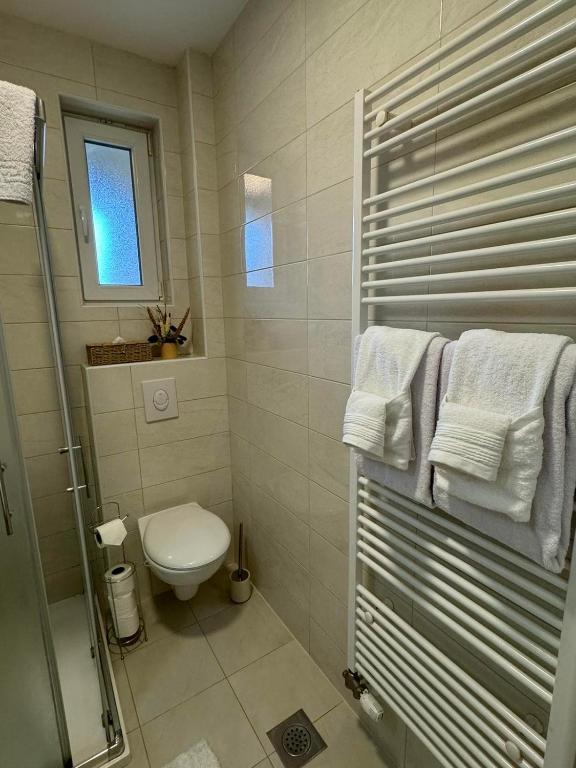 Koupelna v ubytování Bulevar Residence