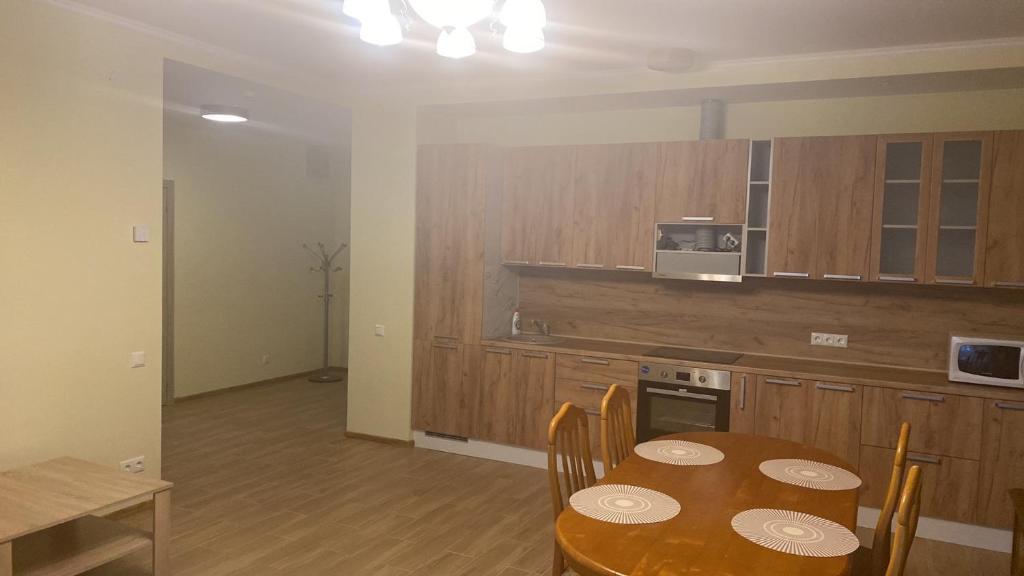 Kuchyň nebo kuchyňský kout v ubytování Appartament Karja 26A/10