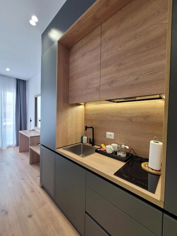 Kuchyň nebo kuchyňský kout v ubytování Jani Studio Apartments