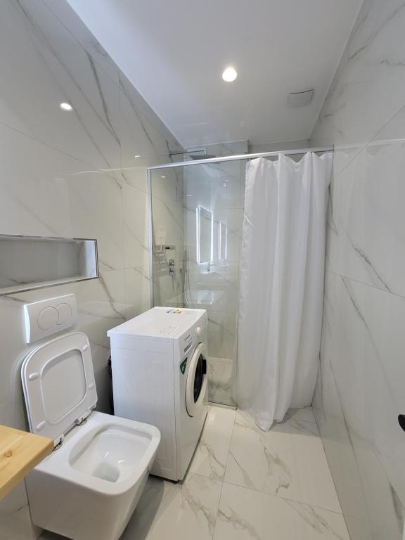 Koupelna v ubytování Jani Studio Apartments