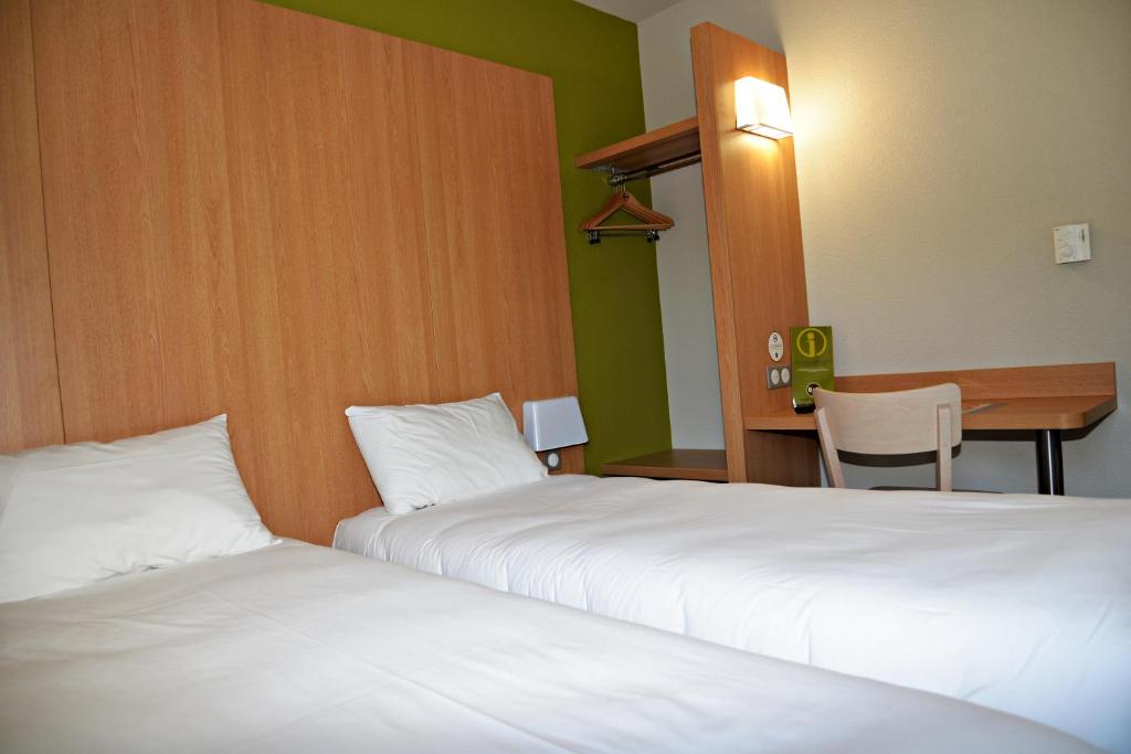 Postel nebo postele na pokoji v ubytování B&B HOTEL Alès - Pôle Mécanique