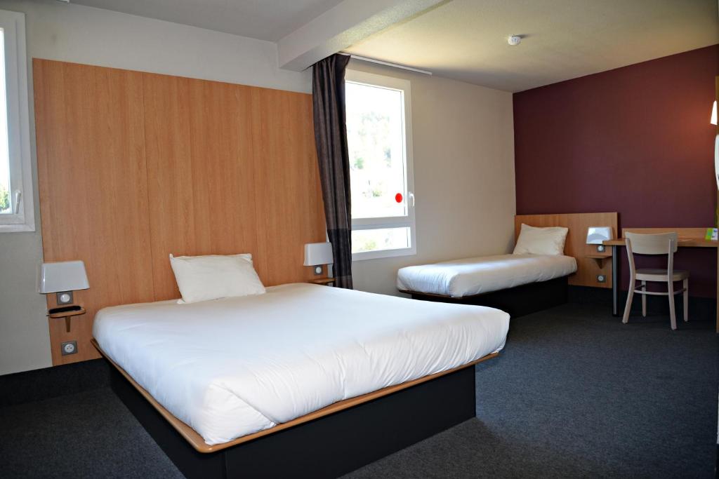 Postel nebo postele na pokoji v ubytování B&B HOTEL Alès - Pôle Mécanique