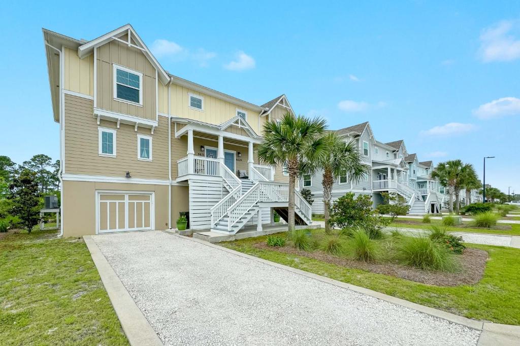 a large apartment building with a driveway at Carlinga Cottage at Lost Key Golf & Beach Club in Pensacola