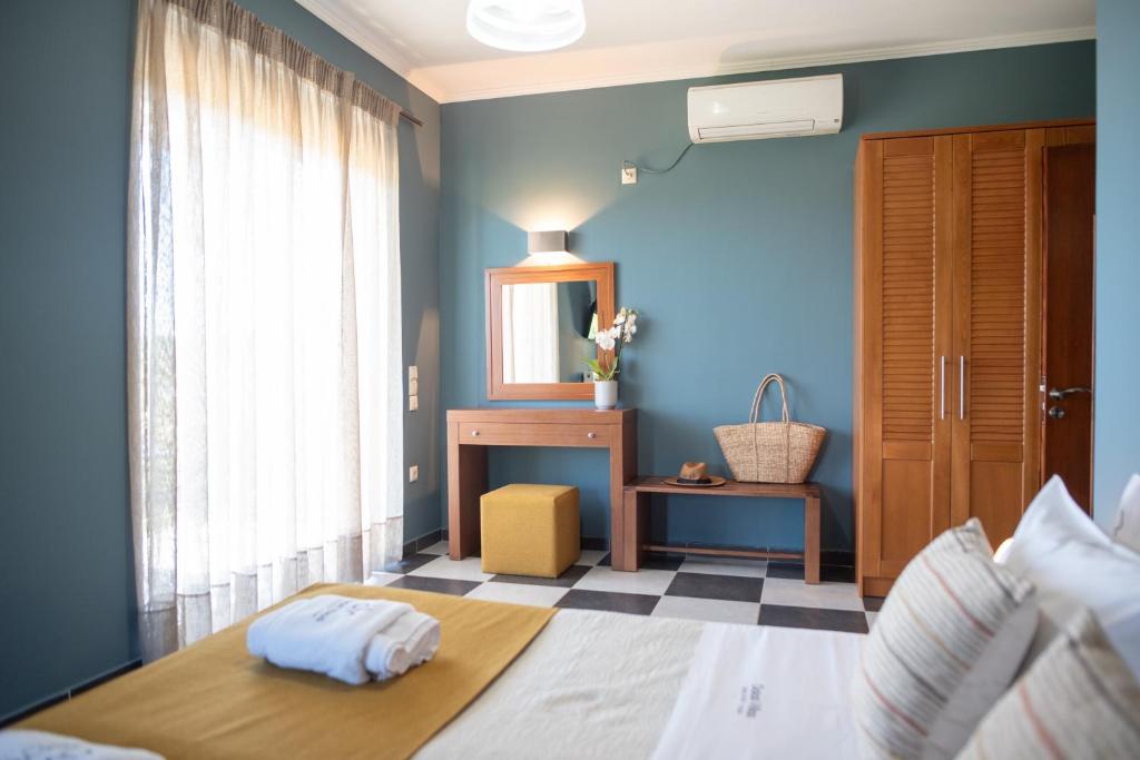 Łóżko lub łóżka w pokoju w obiekcie Dalasvillas SkalaMare