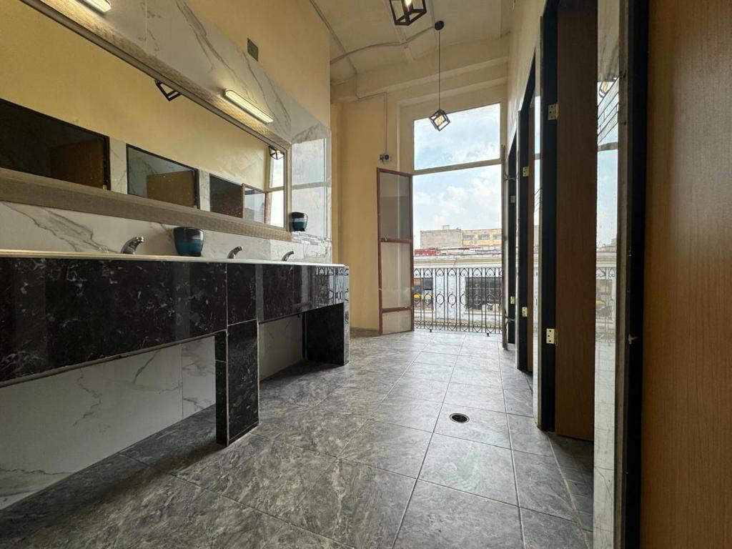 Kuchyň nebo kuchyňský kout v ubytování Rooms Zocalo